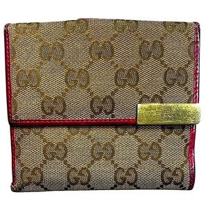 Gucci canvas and pink leather bifold wallet